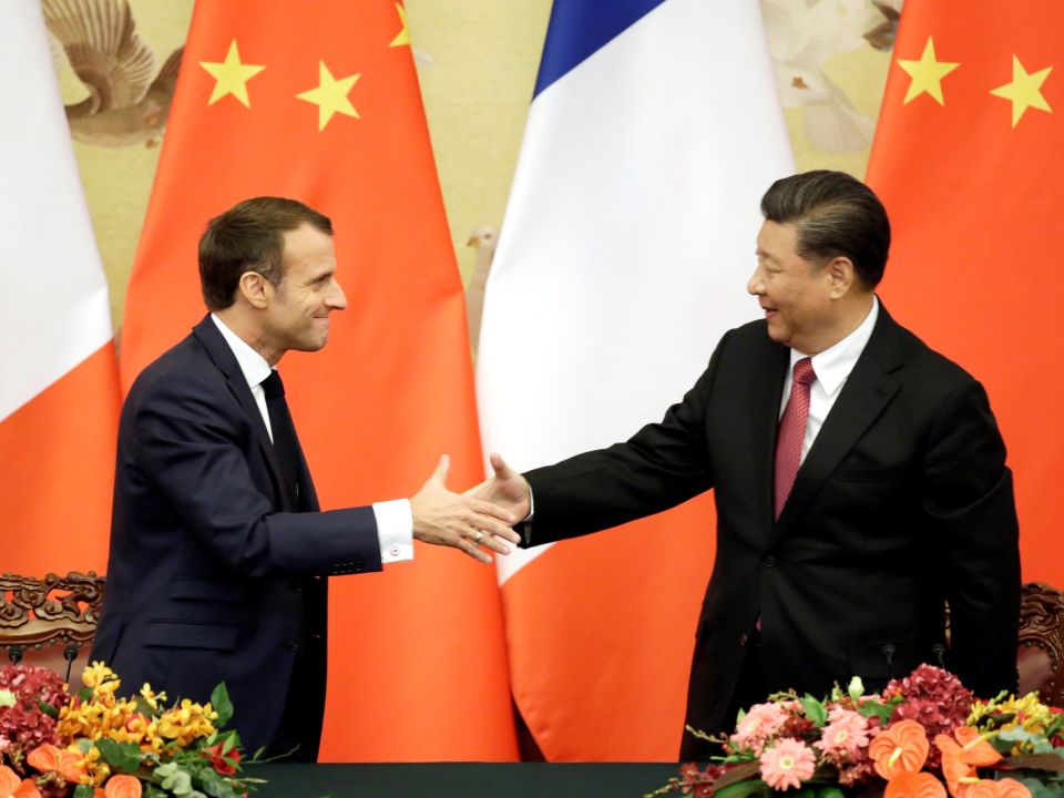 Emmanuel Macron, y  Xi Jinping